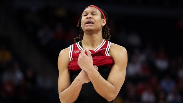 Indiana Hoosiers forward Malik Reneau (5) reacts after fouling out of the game during the second half against the Nebraska Cornhuskers at Target Center. 